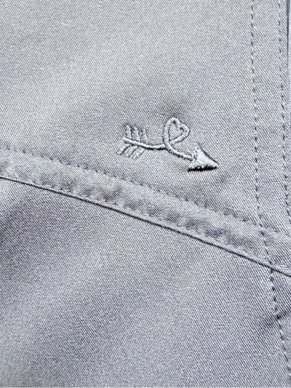 Ava Therese collection by Zavaté Apparel.
Women’s Black Zip-Front Scrub Jacket - Picture 6 of 11